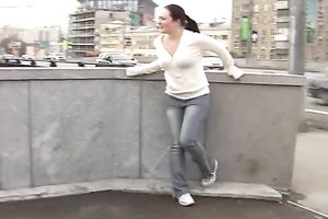 Just an amateur dark brown playgirl in jeans peeing in her panties in public