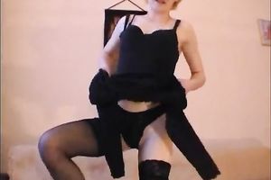 Slutty older blond Jutta rams her wet crack with a fake penis