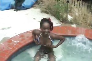 Kinky ebon girl exposes her body relaxing in jacuzzi