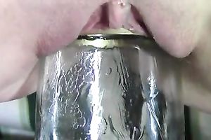 Sexperienced floozy stretching her fur pie with large glass bottle