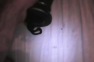 Large dark plastic sex toy permeating her taut vagina