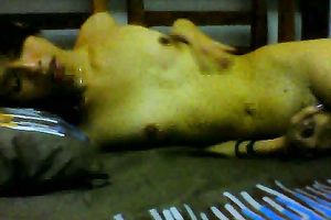 Just a slender Asian dark brown doxy on webcam masturbating