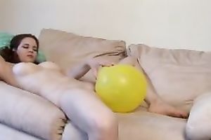 Beautiful amateur wife undressed on the ottoman shows her love tunnel