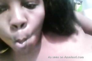 Black sweetheart shows off her tasty tits and then plays with her slit
