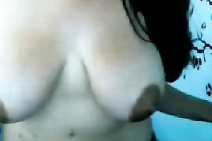 Busty and excited babe shows off topless on cam