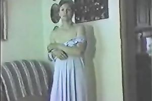 Mature slutwife in a fine costume stripteasing on webcam