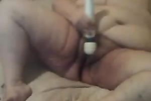 This unsightly and freaky old cheating wife masturbates with a vibrator