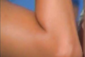 Beautiful brunette hair horny white wife on the beach showing her merry breasts