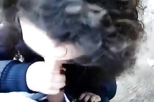 Curly-haired girlfriend sucks my rigid ramrod like a seasoned pro