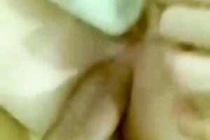 Banging her taut backdoor with her favourite sex toy