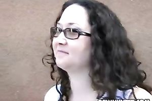 Four eyed overweight dark brown Jem Jewel gives her head