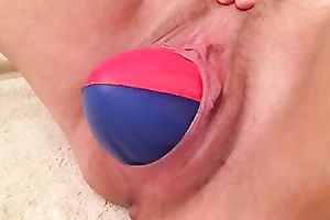 Dirty-minded wifey of my buddy pets her cum-hole with a diminutive ball