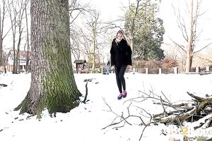 Blonde sweetie in dark thermal panties urinates in the park