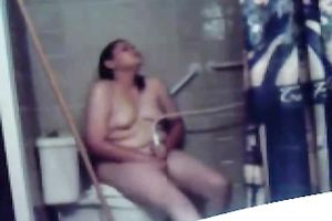 Chubby dilettante black haired nympho masturbates on the biffy bowl