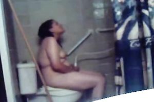 Chubby dilettante black haired nympho masturbates on the biffy bowl