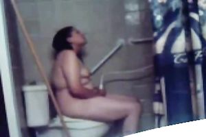 Chubby dilettante black haired nympho masturbates on the biffy bowl
