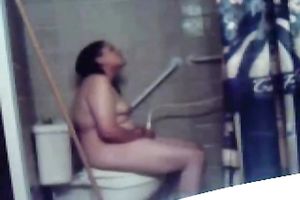 Chubby dilettante black haired nympho masturbates on the biffy bowl