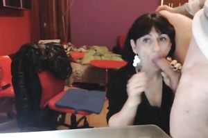 Short haired cheerful brunette hair floozy sucks her man's schlong on web camera