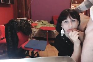 Short haired cheerful brunette hair floozy sucks her man's schlong on web camera