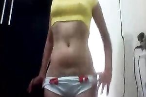 Cute long haired slim brunette hair strips and flashes her milk sacks