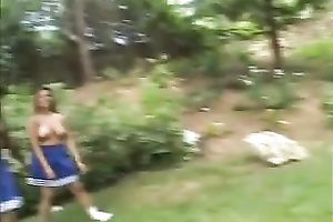 Three breasty milf whores topless outside in the backyard