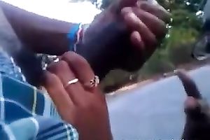 Four eyed swarthy sweetheart doesn't mind engulfing a weenie in public