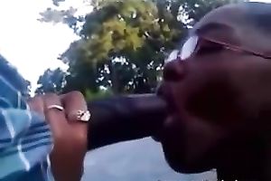 Four eyed swarthy sweetheart doesn't mind engulfing a weenie in public