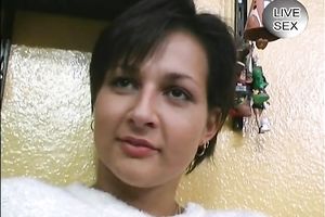 Sizzling short-haired brunette hair bombshell teases on web camera