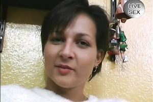 Sizzling short-haired brunette hair bombshell teases on web camera