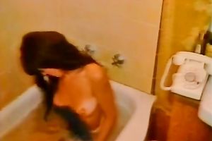 Raven haired sizzling honey rides lengthy wang in cowgirl style on cocktail table