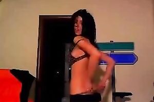 Sizzling dark brown ally dancing seductively during the time that on cam session with me