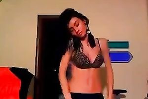 Sizzling dark brown ally dancing seductively during the time that on cam session with me