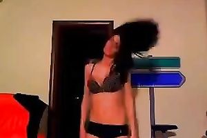 Sizzling dark brown ally dancing seductively during the time that on cam session with me