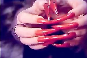 Auburn MILFie nympho with red nails took a dildo to have joy on livecam