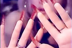 Auburn MILFie nympho with red nails took a dildo to have joy on livecam