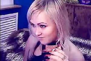 Auburn MILFie nympho with red nails took a dildo to have joy on livecam