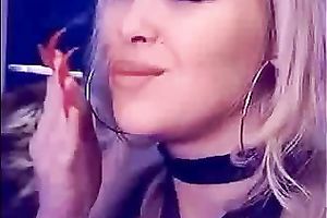 Auburn MILFie nympho with red nails took a dildo to have joy on livecam