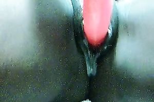 Slutty dark nympho with large rack used red sex toy for masturbation