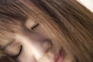 Busty and cute Japanese bimbo in fishnet pantyhose