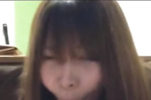 Adorable and youthful auburn haired Asian girlfriend on web camera