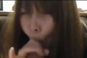 Adorable and youthful auburn haired Asian girlfriend on web camera