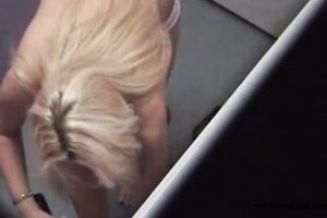 Busty and nice-looking golden-haired sweetheart spied when this babe was changing garments