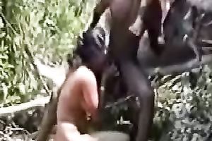 Kinky punjabi chick gets her holes fuckced on a tree