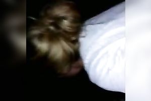 Nasty brunette harlot gives me a head outdoors at night