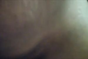 Ugly ebon whore sucks a white knob and takes a ride on it