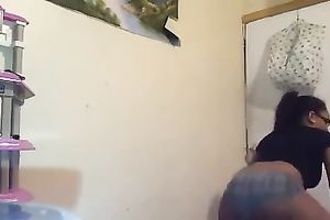 Adorable dilettante brown skin playgirl in constricted shorts shaking booty