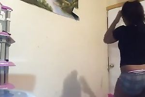 Adorable dilettante brown skin playgirl in constricted shorts shaking booty