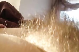 My naughty white women enjoys rubbing her unshaved vagina in homemade solo