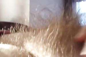 My naughty white women enjoys rubbing her unshaved vagina in homemade solo