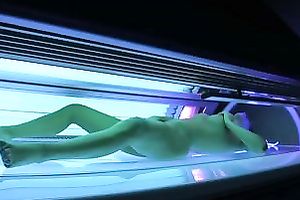 Perfect breasty dark brown hottie in the solarium naked on hidden camera